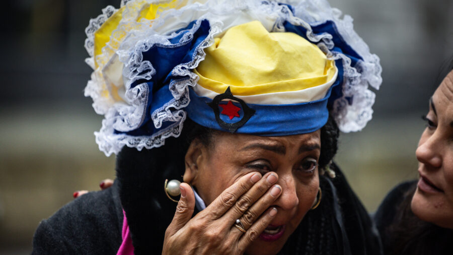 A Bonaire resident sheds a tear before the Hague District Court ruled that the Netherlands breached human rights on Jan. 28. Credit: Laurens Van Putten/ANP/AFP via Getty Images