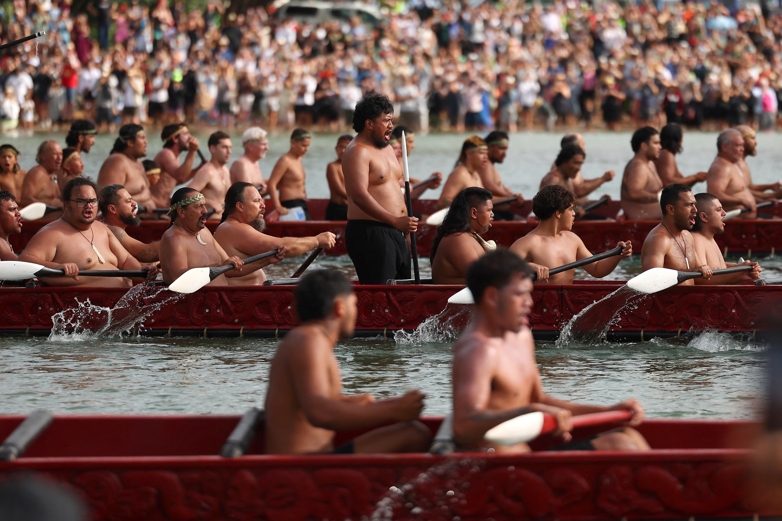 Participants paddle their boats during a waka ceremony in Waitangi on Feb. 6, as part of Waitangi Day commemorations, an annual national event where Indigenous Māori groups highlight ongoing political concerns. Credit: Ben Strang/AFP via Getty Images