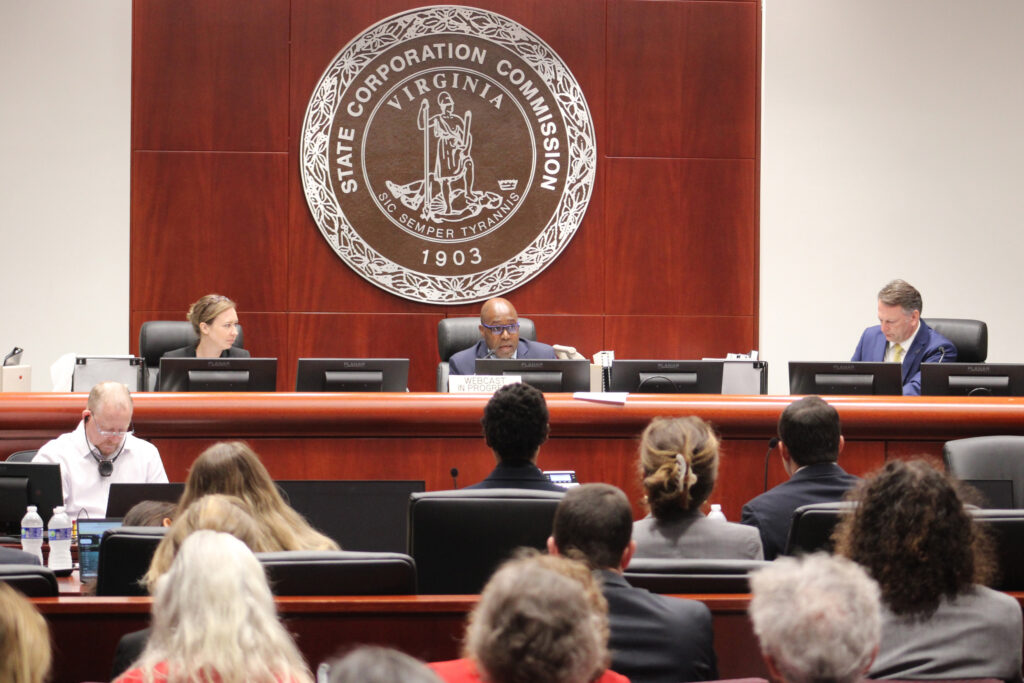 Virginia State Corporation Commission judges meet during a hearing for the Chesterfield Energy Reliability Center. Credit: Charles Paullin/Inside Climate News