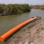 Border buoys are installed in the Rio Grande as it runs through Brownsville on March 6. Credit: Michael Gonzalez