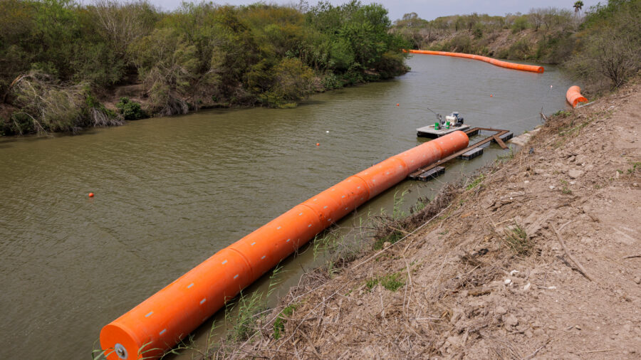Border buoys are installed in the Rio Grande as it runs through Brownsville on March 6. Credit: Michael Gonzalez