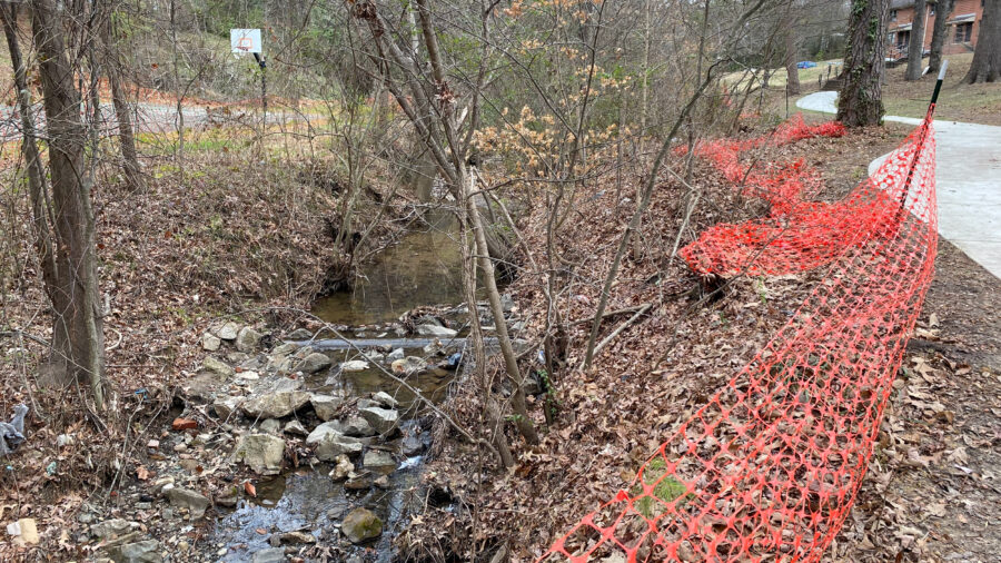 A creek flows near a public recreation center in Durham, N.C., where chemicals are seeping into the waterway about a half-mile upstream. Credit: Lisa Sorg/Inside Climate News