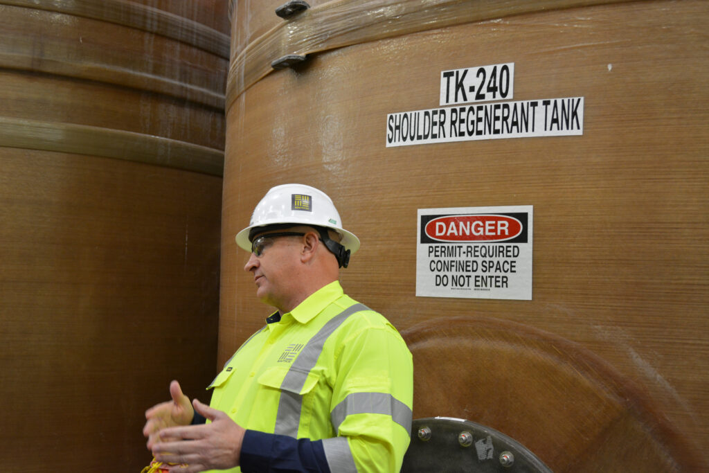 Pat Risner, South32 Hermosa president, explains how the project’s wastewater treatment facility treats contaminants found in the groundwater the company is removing from the aquifer on Feb. 18. Credit: Wyatt Myskow/Inside Climate News