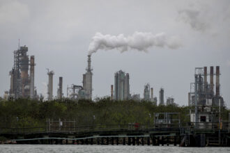 An oil refinery sits near the Corpus Christi Ship Channel in Texas. Credit: Loren Elliott/AFP via Getty Images
