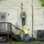 Power line crews with Georgia Power work at a home in Savannah on Aug. 6, 2024. Credit: Megan Varner/Getty Images