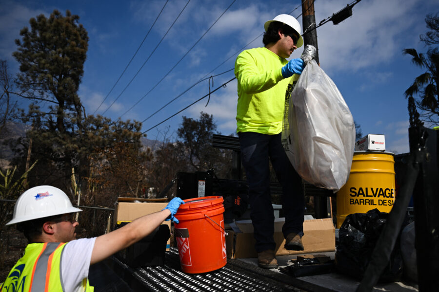EPA contractors remove household hazardous waste as they search through homes damaged by the Eaton Fire in Altadena, Calif., on Jan. 30, 2025. Credit: Patrick T. Fallon/AFP via Getty Images