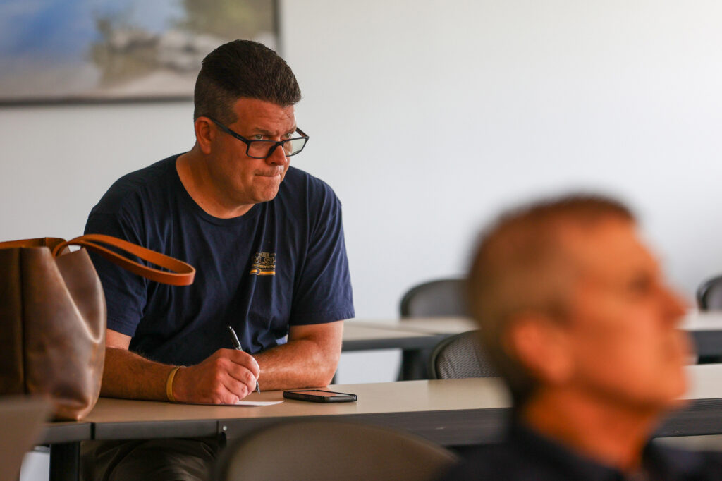State Rep. Jamie Walsh takes notes during a presentation on an AI pilot program on July 30, 2025. Credit: Jason Ardan/The Citizens’ Voice via Getty Images