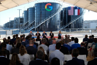 Texas Gov. Greg Abbott leads a panel with Alphabet and Google CEO Sundar Pichai at Google’s data center in Midlothian on Nov. 14, 2025. Credit: Ron Jenkins/Getty Images