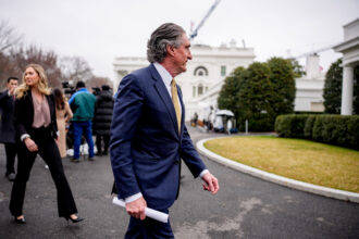 Interior Secretary Doug Burgum walks into the West Wing of the White House on March 6 in Washington, D.C. Credit: Andrew Harnik/Getty Images