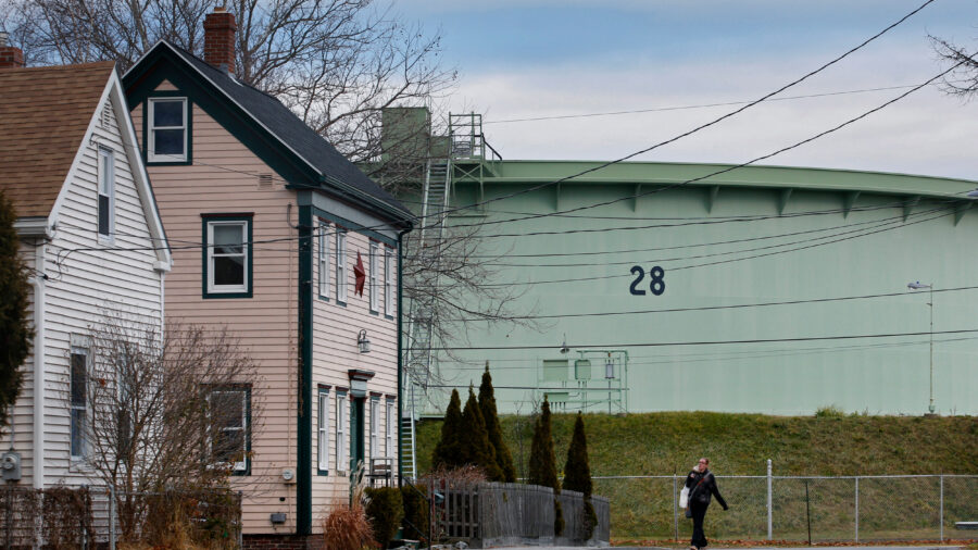 Petroleum storage tanks reside next to the Ferry Village neighborhood near the South Portland waterfront. Credit: Derek Davis/Portland Portland Press Herald via Getty Images