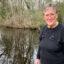 Brenda Schwab moved to Rowland in November 2024. She’s been sampling waterways in the area because she is concerned about waste from CAFOs potentially entering creeks and swamps. Credit: Lisa Sorg/Inside Climate News