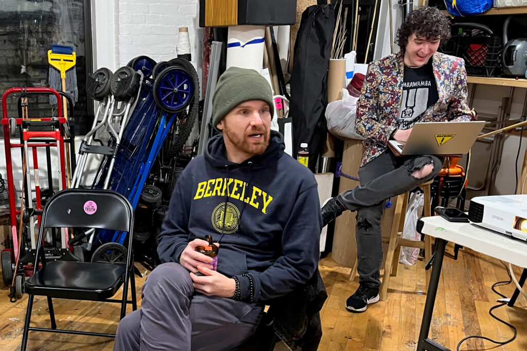 Nate Smith and Henry Pratt prepare for a training in public speaking at the group’s Brooklyn studio. Credit: Nicholas Kusnetz/Inside Climate News
