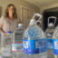 Stacey Greer has been filling jugs of water from her tap in Cadiz, Ohio, to test them for contaminants. Credit: Julie Grant/The Allegheny Front