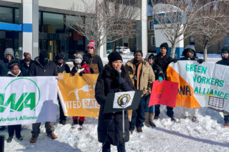 Morgan Harper, a community organizer and former U.S. Senate candidate, speaks at a protest in January outside the offices of the Public Utilities Commission of Ohio in Columbus, urging officials to reject a rate increase from the local utility. Credit: George Shillcock/WOSU