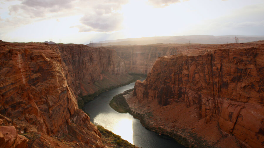 Sunlight glimmers on the Colorado River near Page, Ariz. on Nov. 2, 2022. Credit: Alex Hager/KUNC