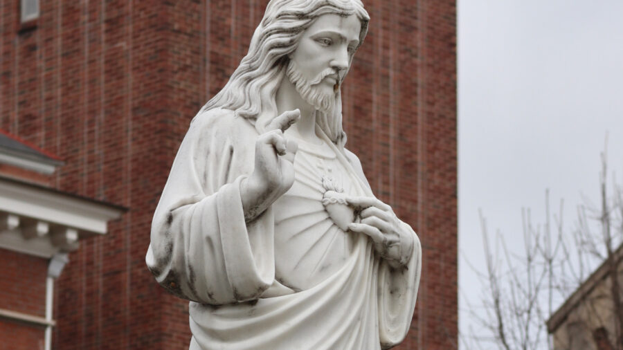 A statue of Jesus stands outside the Passionist monastery in Louisville, Ky. Credit: James Bruggers/Inside Climate News