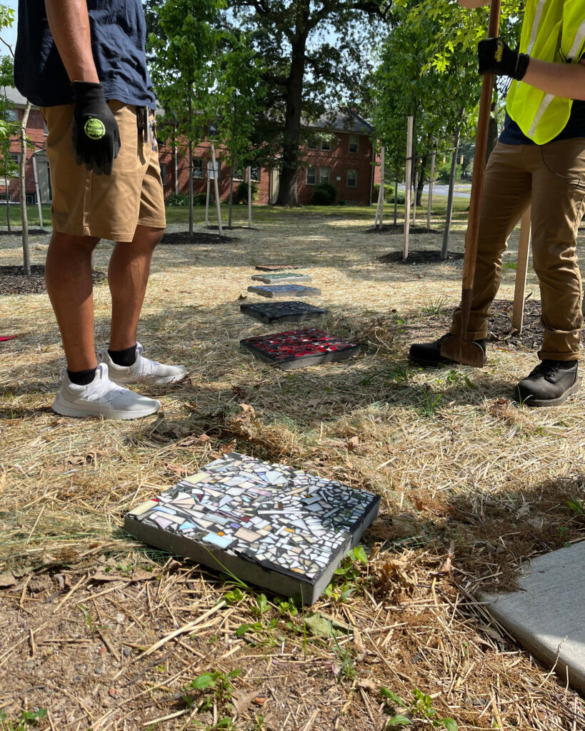 Local teenagers from Nexus Woodbourne Family Healing, who participate in the Faith Presbyterian Youth Environmental Stewards program through the city's B'More Beautiful office, are installing steps in the Faith Forest. Credits: Rev. Cat Dodson Goodrich/Faith Presbyterian