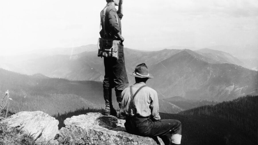 Ranger Griffin and Forest Guard Cameron on fire patrol duty in 1909 from the top of Mount Silcox near Thompson Falls, Mont. Credit: W. J. Lubken/Forest Service