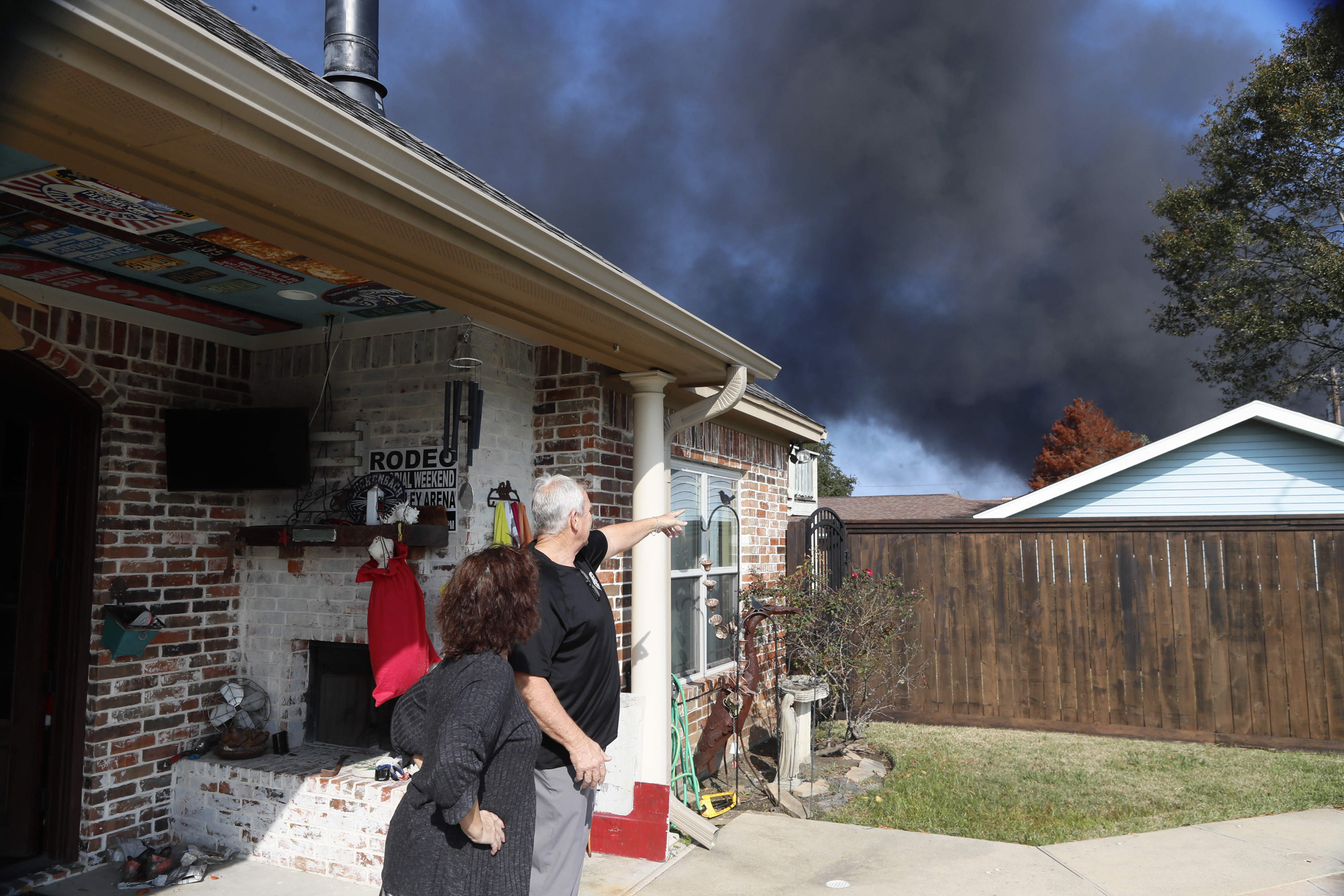 People watch as a fire at the TPC Group’s chemical plant continues to burn in Port Neches, Texas, on Nov. 27, 2019. Credit: Steven Song/Xinhua via Getty Images