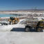 Mining trucks load lithium sulfate in Chile’s Atacama Salt Flat on July 29, 2024. Credit: Lucas Aguayo Araos/Anadolu via Getty Images