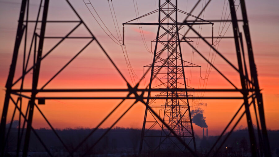 Transmission lines lead away from a coal-fired power plant in China Township, Mich. Credit: Jim West/UCG/Universal Images Group via Getty Images
