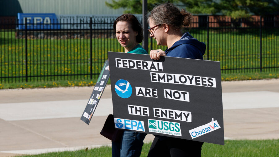 Demonstrators march during a “Hands off the EPA” rally outside the agency’s offices in Ann Arbor, Mich., on April 22, 2025. Credit: Jeff Kowalsky/AFP via Getty Images