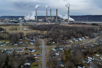 The coal-fired Mill Creek Generating Station is seen from the Valley Village neighborhood on Feb. 14 in Louisville, Ky. Credit: Jon Cherry/Getty Images