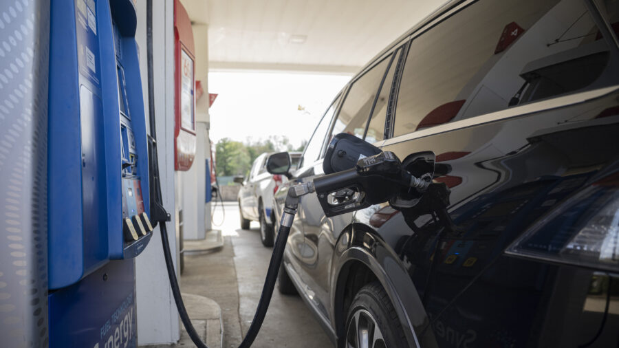A vehicle is filled with gasoline at an Exxon station on April 1 in Arlington, Va., where prices exceed $4 per gallon. Credit: Celal Gunes/Anadolu via Getty Images