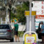 People fill their vehicles at a gas station in Miami on Monday. Credit: Joe Raedle/Getty Images