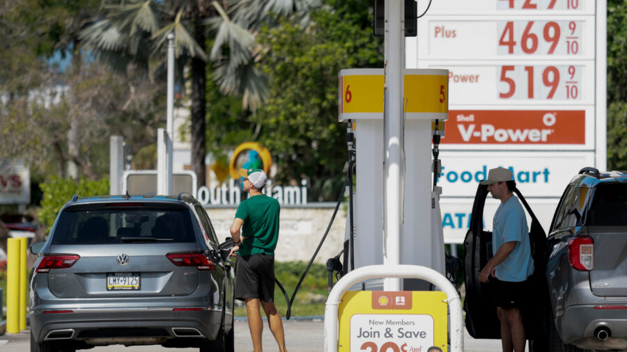 People fill their vehicles at a gas station in Miami on Monday. Credit: Joe Raedle/Getty Images