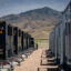 Workers are seen at the Pastoria Battery Energy Storage System facilities on April 16 in Arvin, Calif. Credit: Eric Thayer/Los Angeles Times via Getty Images