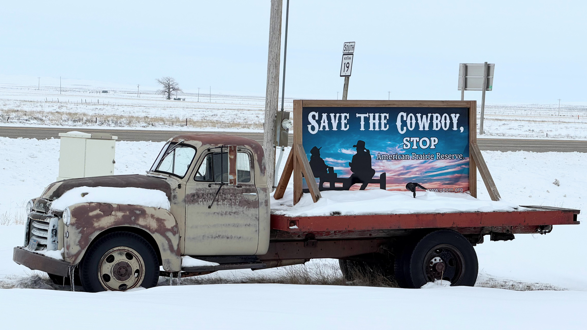 Anti-buffalo billboards and banners produced by Save The Cowboy are found all over Phillips County, Montana. Credit: Blaine Harden/Inside Climate News