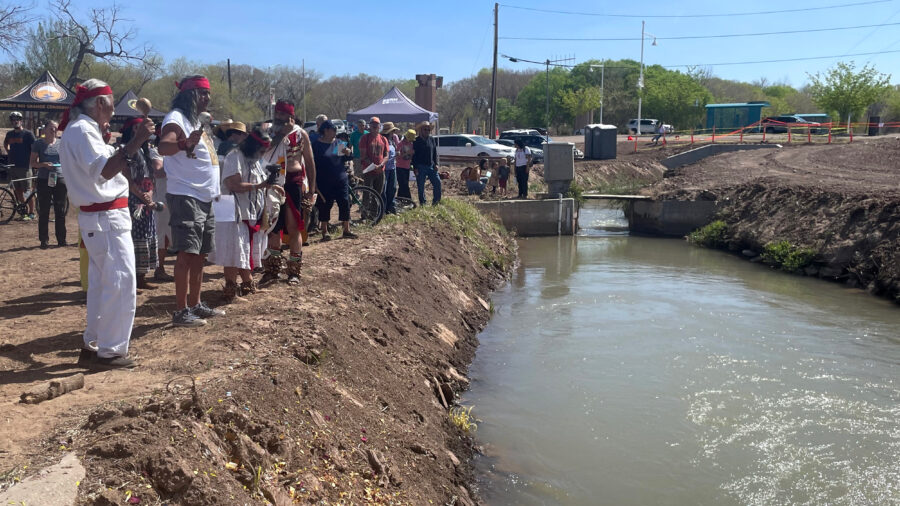 Community members participate in a blessing ceremony of the Atrisco Acequia Madre in Albuquerque, N.M. Credit: Tina Deines/Inside Climate News