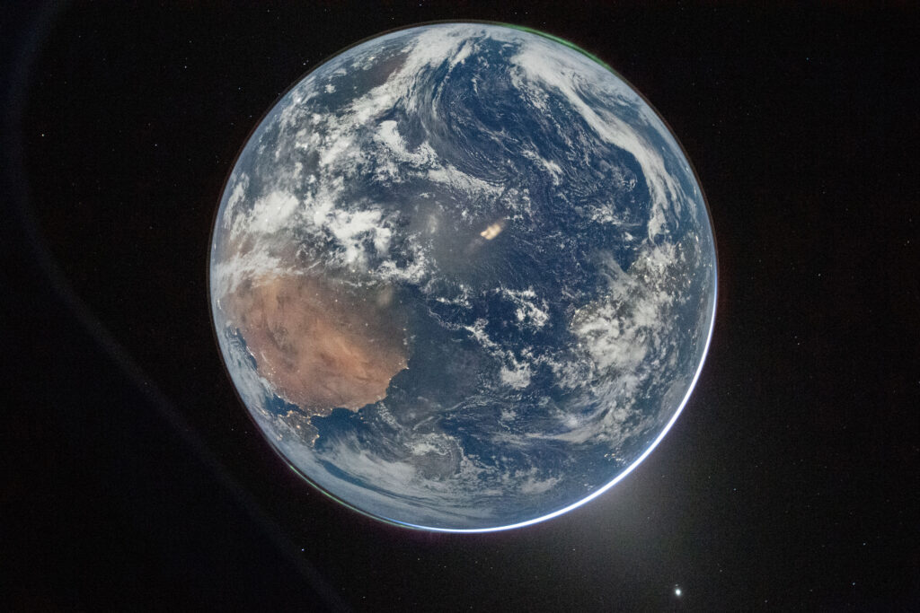 This image of Earth was taken on April 2 by an Artemis II crew member through the window of the Orion spacecraft. Credit: NASA