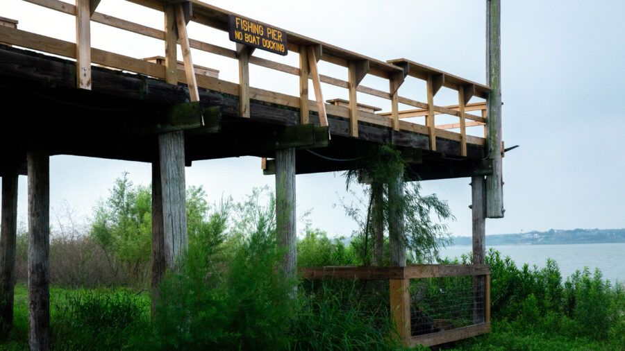 Water sits 30 or more feet below the base of a fishing pier at Lake Corpus Christi on April 28. Credit: Dylan Baddour/Inside Climate News
