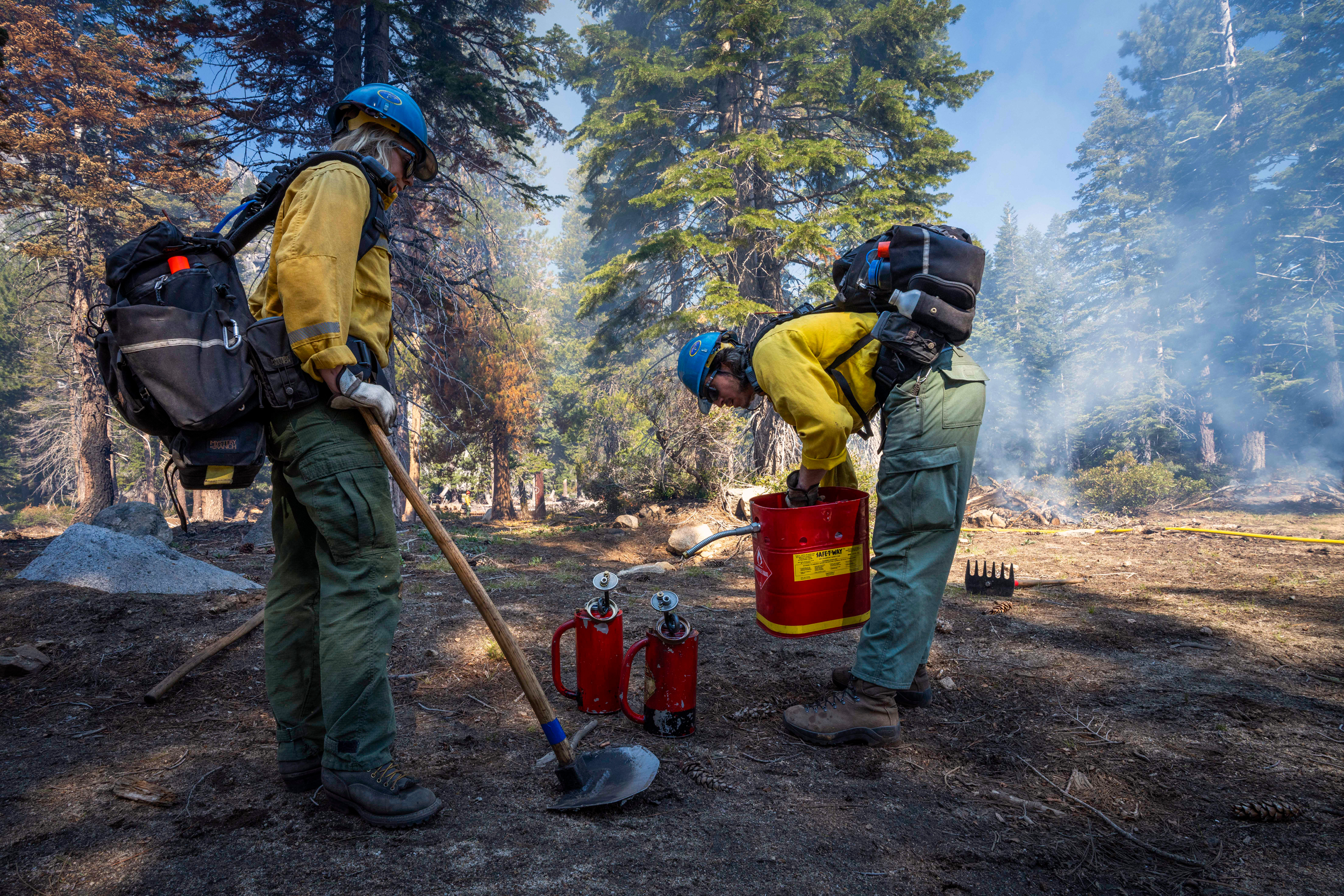 Firefighters refuel during a prescribed burn at the Lake Tahoe Basin Management Unit in California on May 7, 2025. Credit: Preston Keres/USDA Forest Service