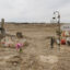Graves mark the site of the 1890 Wounded Knee Massacre on the Pine Ridge Reservation in South Dakota, where U.S. troops killed more than 250 Lakota men, women and children. Credit: Carla Samon Ros/CJI