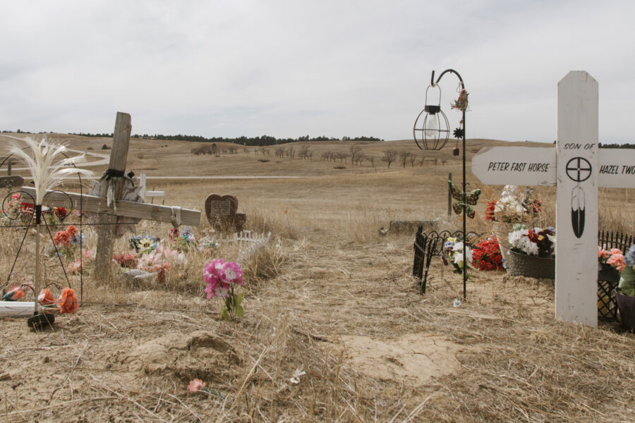 Graves mark the site of the 1890 Wounded Knee Massacre on the Pine Ridge Reservation in South Dakota, where U.S. troops killed more than 250 Lakota men, women and children. Credit: Carla Samon Ros/CJI