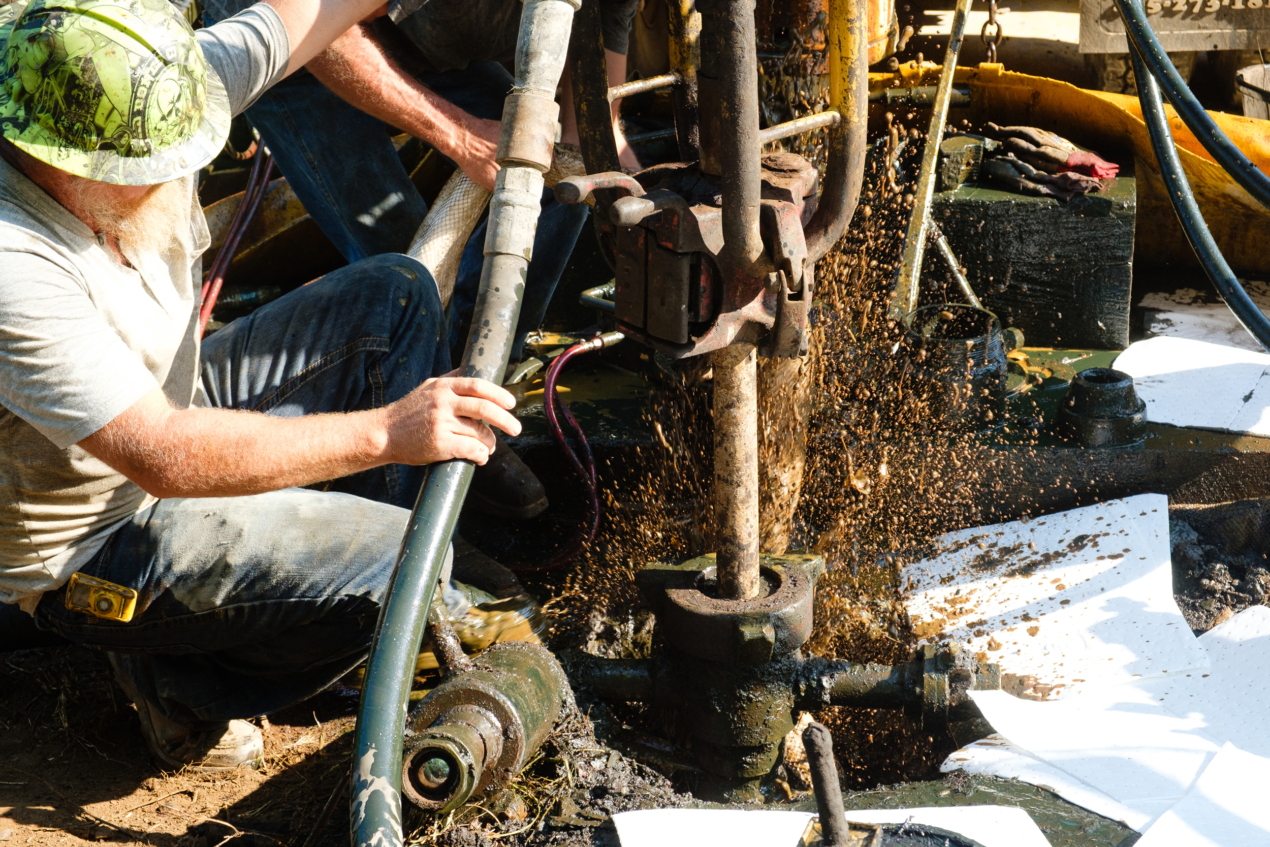 Doneghy #2 blows out a mixture of saline water and crude oil as the plugging operation disturbs the well’s pressure.