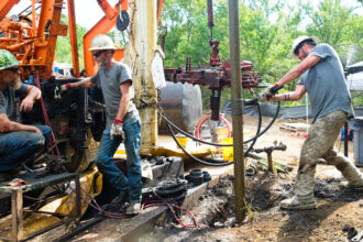 A crew works to plug an orphaned well in the Deep Fork National Wildlife Refuge of Oklahoma.