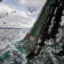 A fishing trawler drags its net through the waters near Greenock, Scotland, on March 5, 2019. Credit: Jeff J Mitchell/Getty Images