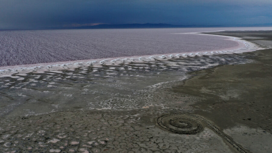 The Spiral Jetty, constructed by artist Robert Smithson in 1970, sits near the Great Salt Lake’s water on Aug. 1, 2021 in Utah. Credit: Justin Sullivan/Getty Images