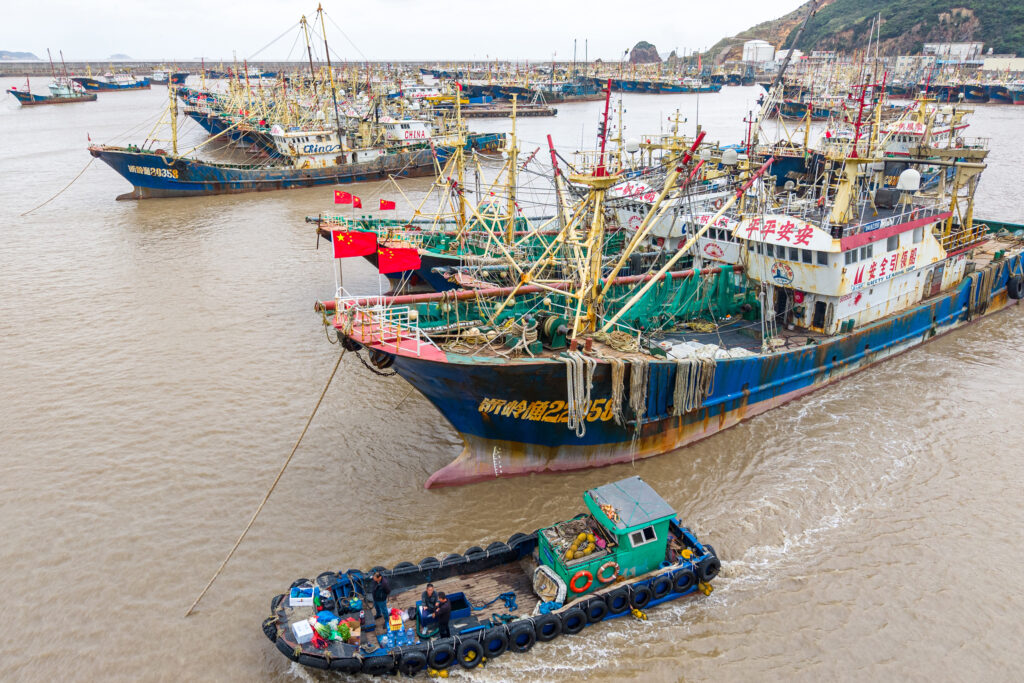 Chinese fishing vessels are seen moored at a port in Taizhou, China. Credit: Xu Weijie/VCG via Getty Images