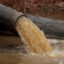 Pipes divert raw sewage into the C&O Canal around a broken section of the Potomac Interceptor on Feb. 16 in Cabin John, Md. Credit: Chip Somodevilla/Getty Images
