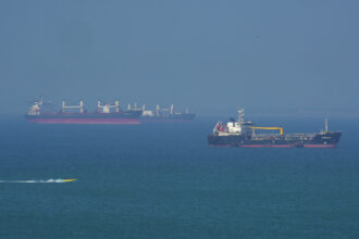 An oil tanker navigates the Strait of Hormuz on April 28. Credit: Asghar Besharati/Getty Images