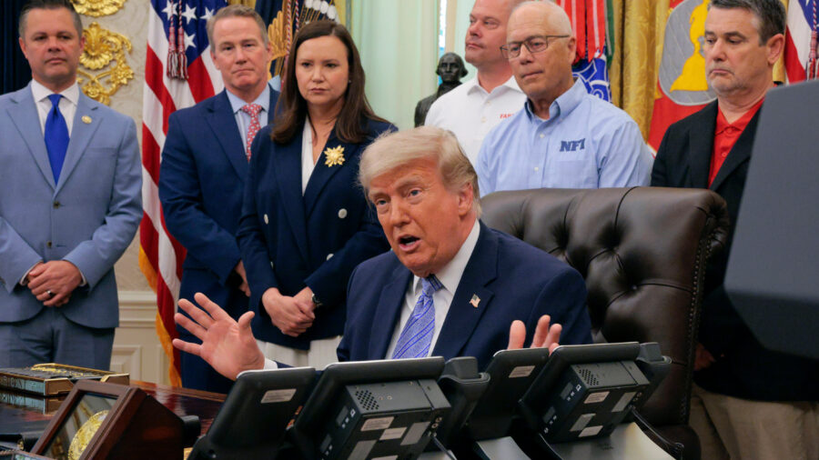 President Donald Trump is joined by grocery store owners and supermarket corporation executives as he announces regulatory rollbacks on chemical refrigerants at the White House on May 21. Credit: Chip Somodevilla/Getty Images