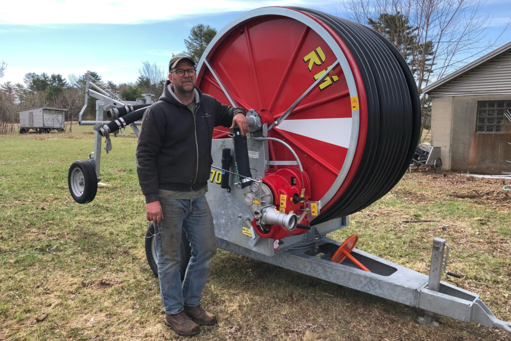At Crystal Spring Farm, Seth Kroeck is adding irrigation lines to part of his blueberry fields this year to protect them from drought. Building the well and installing enough lines to cover a quarter of his 72 acres of wild blueberries cost around $90,000. Credit: Sydney Cromwell/Inside Climate News