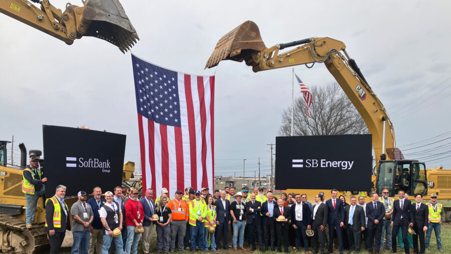 Officials and local workers pose for photos following the ceremonial groundbreaking for SoftBank’s PORTS Technology Campus near Piketon, Ohio. Credit: Dan Gearino/Inside Climate News