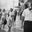 People walk around downtown Los Angeles as smog fills the sky in 1958. Credit: Herald Examiner Collection/Los Angeles Public Library