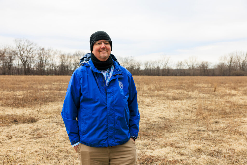 Civil engineer Richard Fisher stands on a parcel of land owned by the Forest Preserves of Cook County in Glenwood. Government officials are assessing the feasibility of turning the area into wetlands to help control flooding. Credit: Anthony Vazquez/Sun-Times
